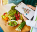 holding-schematic-meal-plan-diet-with-various-healthy-products-background_194143-19
